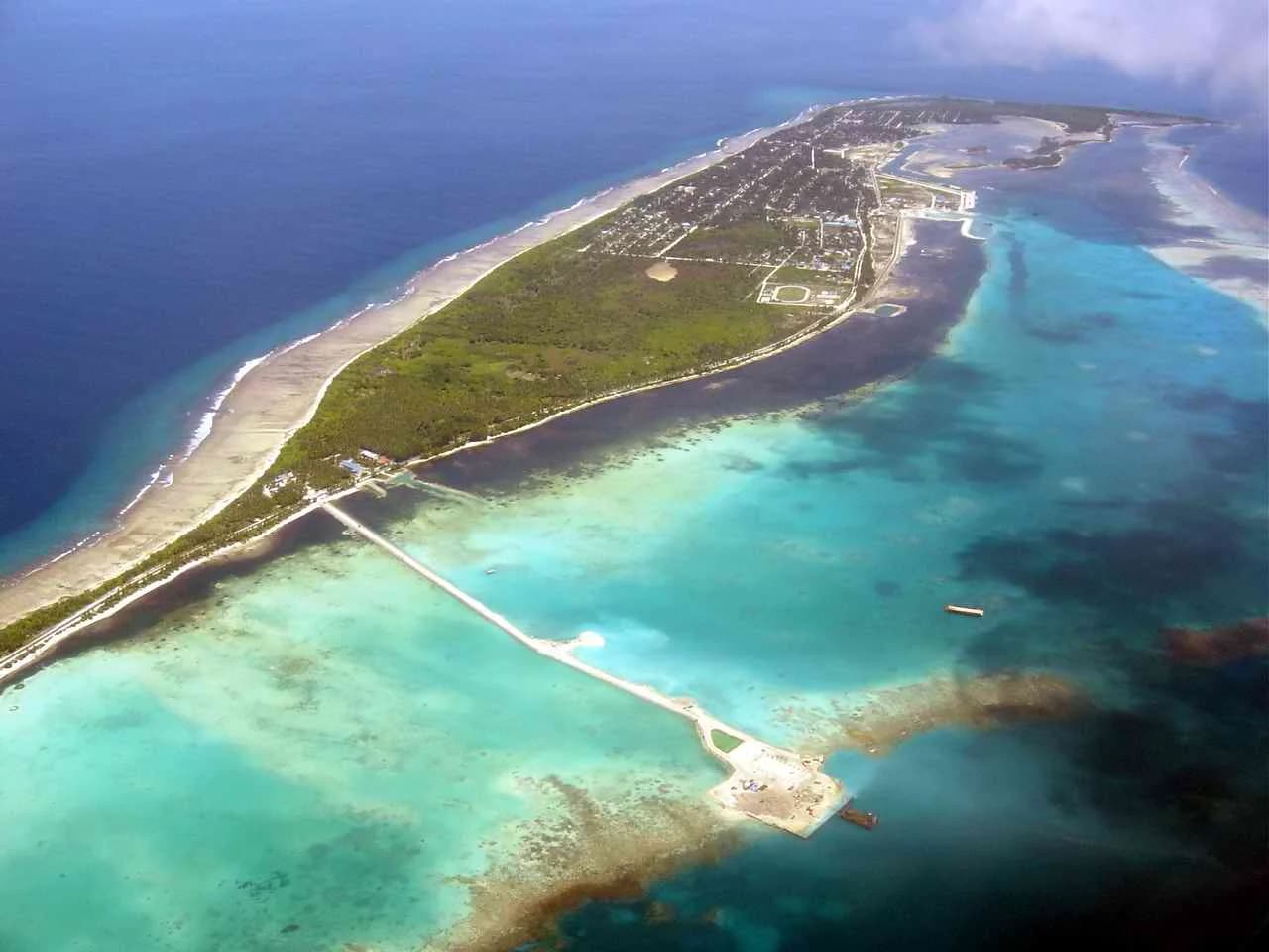 Aerial view of a regional port causeway reaching into the lagoon
